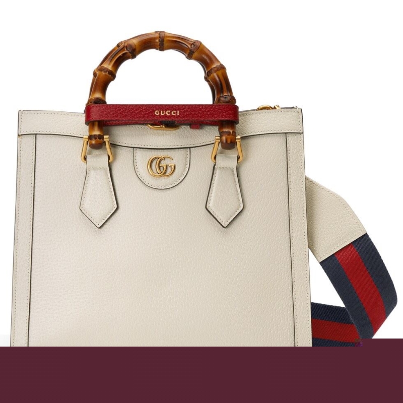 G*u*i top handle bags
